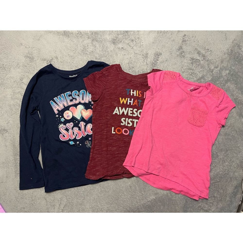 Three 5T shirts